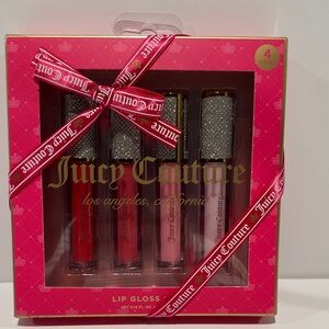 Juicy Couture (4) Piece Lip Gloss in Special Bling Juicy Couture bottles.